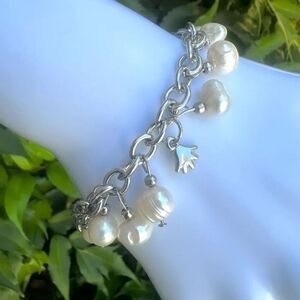 Silver tone fresh water pearl charm bracelet